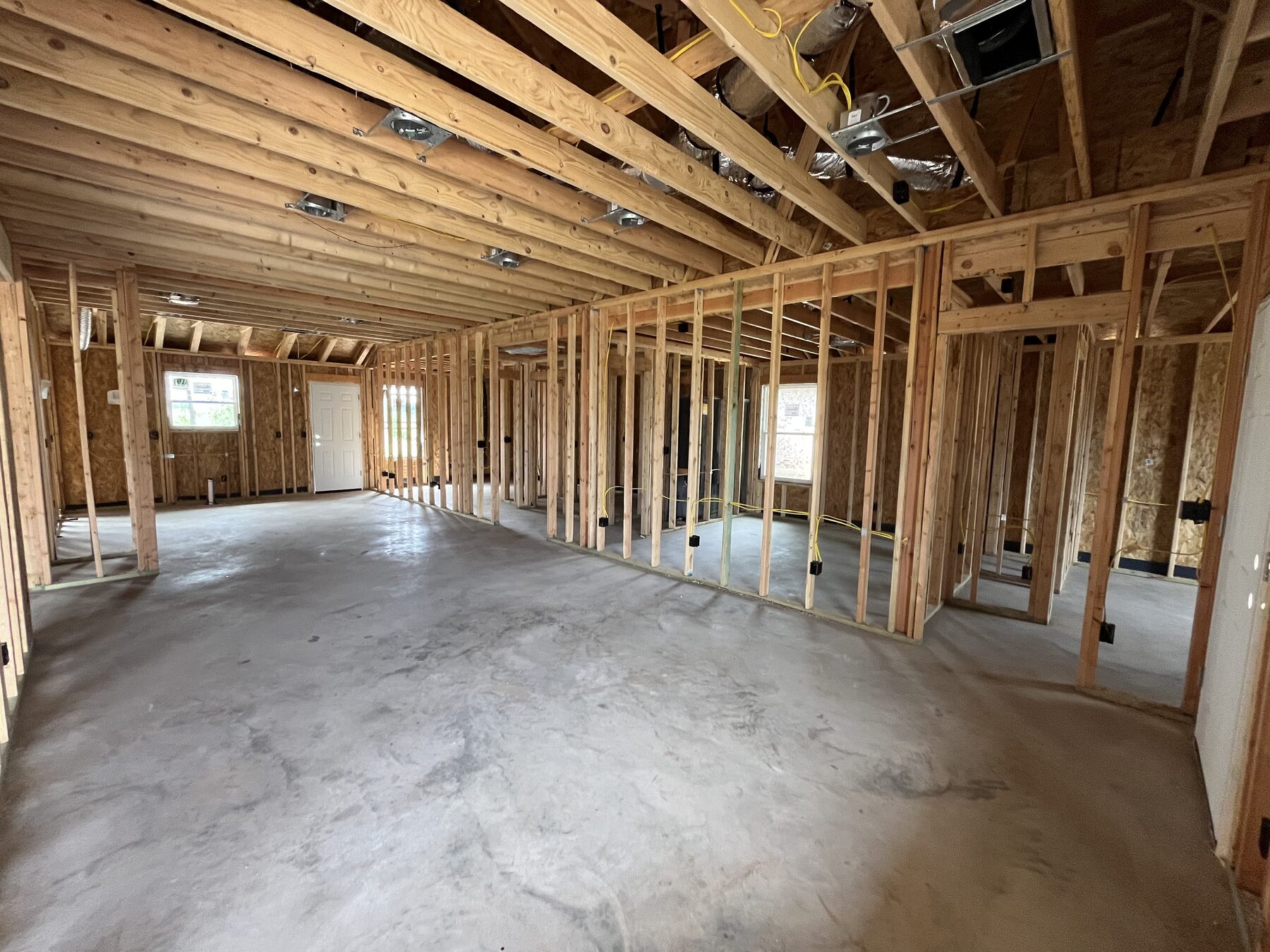 Open living and kitchen framing during new home construction