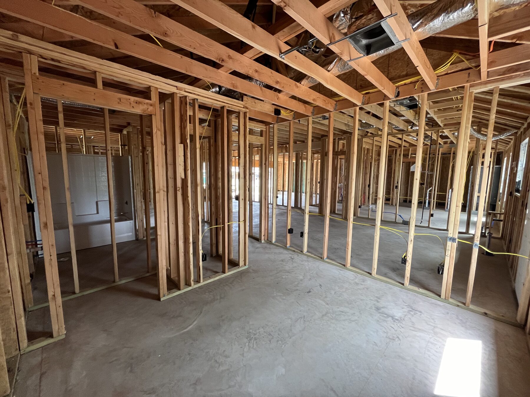 Residential framing and mechanical rough-in during a Central Oklahoma home build