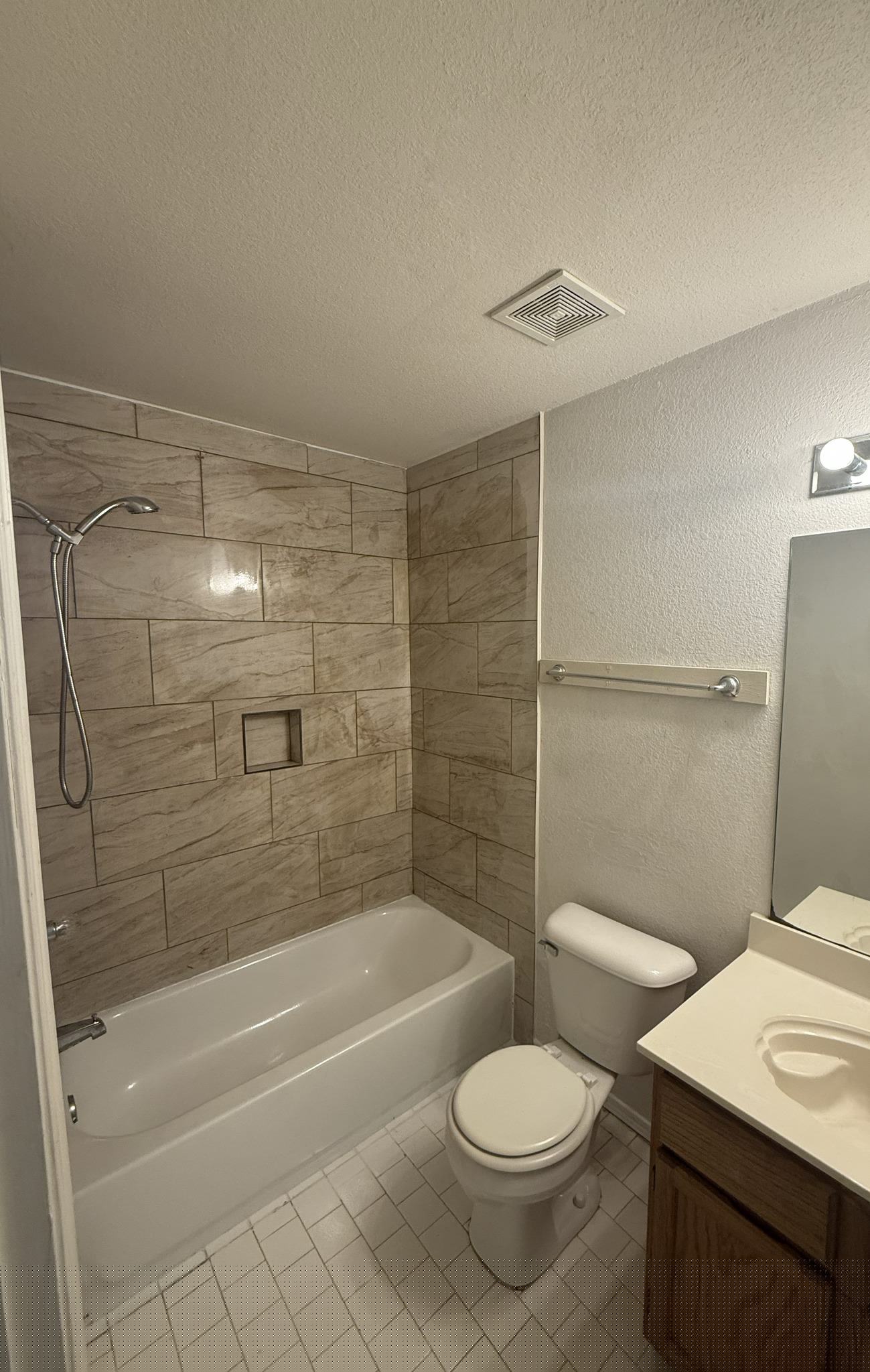 Finished tile tub and shower remodel with built-in niche in Norman, Oklahoma